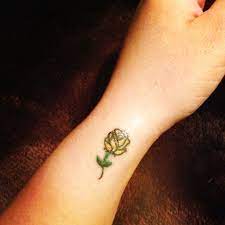 Small Yellow Rose Tattoo But I Would Personally Do Red It S Still Cute Though Yellow Rose Tattoos Small Rose Tattoo Rose Tattoo