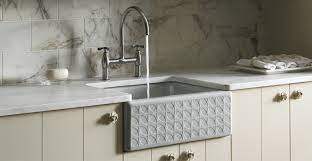 a fireclay farmhouse kitchen sink
