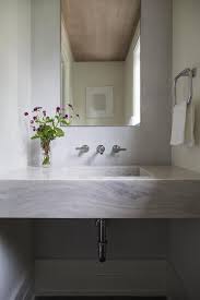 a marble floating sink vanity is