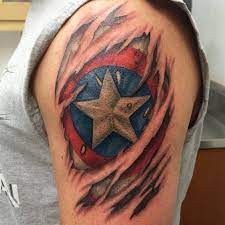 Pin By Kaitlynn Malone On Tattoos Captain America Tattoo Skin Tear Tattoo Tattoos