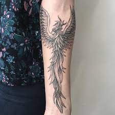 60 Incredible Phoenix Tattoo Designs You Need To See Phoenix Tattoo Design Phoenix Tattoo Popular Tattoos