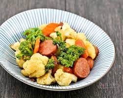 Incredible healthy ginger cashew chicken stir fry packed with veggies like bell pepper, broccoli and carrots, and served with a flavorful coconut cauliflower rice! Broccoli Cauliflower And Sausage Stir Fry Roti N Rice