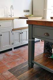House With Red Quarry Tile Floor Google Search House With Red Quarry Tile Floor Google Search F Grey Kitchen Floor Freestanding Kitchen Kitchen Flooring