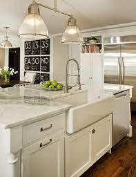 kitchen island with sink and dishwasher