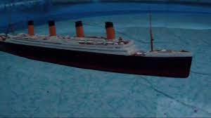 rms titanic model floating at dusk