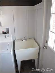 dressing up a mud room sink beneath