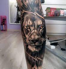 Top 63 Lion Sleeve Tattoo Ideas 2021 Inspiration Guide Mens Lion Tattoo Tattoo Sleeve Designs Lion Tattoo