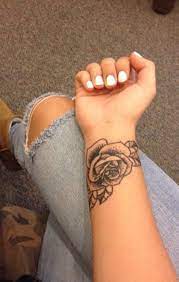 50 Beautiful Rose Tattoo Ideas Rose Tattoos On Wrist Wrist Tattoos For Women Small Wrist Tattoos