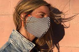 She spends 12 hours knitting one scarf. Chicago Businesses Making Non Medical Face Mask