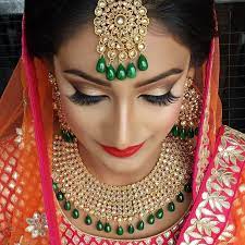 Photo Of Gold And Green Polki Maangtikka And Necklace Bridal Jewellery Design Bride Jewellery Indian Bridal Makeup