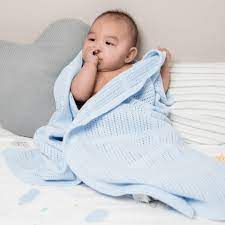 Featuring a cellular design to ensure safety, these breathable blankets are made of a soft cotton fabric. Lulujo Cellular Baby Blanket