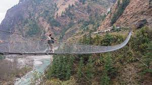 Hanging Bridge Of Ghasa Nepal Like Many Crossings In Nepal The Hanging Bridge Of Ghasa Is Used By Both Humans And Animals Ali Scary Bridges World Roman City