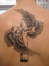 Angel wing tattoos have graced bodies with their symbolism for many decades. Angel Cross Tattoos Fash4style