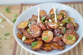 Indian style noodles with chilli garlic sauce. Baked Potatoes In Chili Garlic Sauce