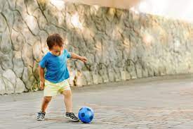 Learning to kick the ball can be a big challenge for a toddler as it requires the shifting of weight between the feet and a coordinated effort to focus on this activity grows with your child as you can begin singing the song even with a small infant and work up to alternating letters with your toddler as. Motor Milestones Kicking A Ball Kinedu Blog