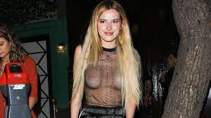 Bella Thorne Shows Off Her Nipple Piercing, Goes Braless in Completely  Sheer Top | Entertainment Tonight
