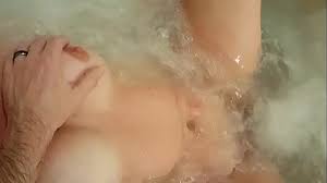 Wife orgasms from jacuzzi jet and nipple play - XNXX.COM