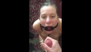 Beautiful slave girl with a ring gag in her mouth Audrey Rose is face fucked