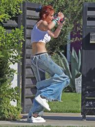 Bella Thorne flashes her nipple piercing in a see-through crop top as she  dances in the street | The Scottish Sun