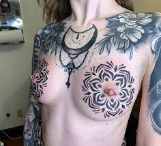Tattoo uploaded by Brittany Robertson • Dot work- Mandalas on boobs •  Tattoodo