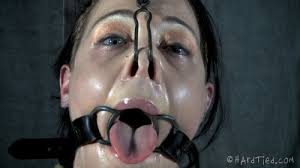 Beautiful slave girl with a ring gag in her mouth Audrey Rose is face fucked