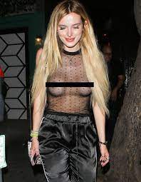 Bella Thorne exposes boobs and nipple piercing in non-existent top - Daily  Star
