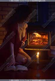 Sensual erotic portrait of beautiful sexy half naked woman sitting by the  hearth with a book | Fashion, Commercial, Fine Art Stock Photo Archive