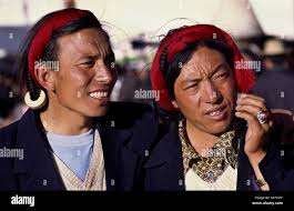 Khampa men with traditional hairstyle. Barkhor street, Lhasa, Tibet Stock  Photo - Alamy