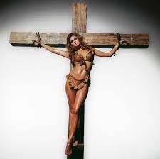 The Story Behind the Crucified Raquel Welch Photo Hanging In Khloe  Kardashian's Home | Glamour