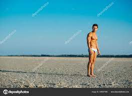 Handsome Man Desert Muscled Male Model Swimwear Salt Lake Background Stock  Photo by ©sergelee 448067956