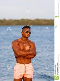 Muscular Young Athletic Man on the Beach with a Naked Torso in Underwear.  Hot Black Beautiful Guy, Fitness Model. Stock Photo - Image of male,  attractive: 98385824