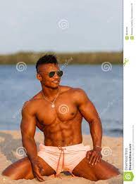 Muscular Young Athletic Man on the Beach with a Naked Torso in Underwear.  Hot Black Beautiful Guy, Fitness Model. Stock Image - Image of aesthetics,  nude: 99462991