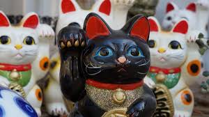 Maneki-neko, the Japanese fortune cat ...