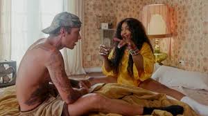 SZA puts on VERY risque display as she frolics with a shirtless Justin  Bieber before slipping into bejeweled bodysuit to twerk on a ROBOT for  Snooze music video | Daily Mail Online