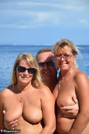 Chubby naked Sweet Susi indulging doggystyle in sizzling beach threesome -  Pichunter