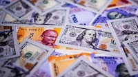 Rupee rises 10 paise to 87.59 against US dollar in early trade