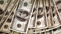 Dollar gains over dong