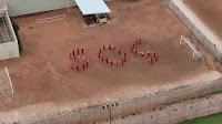 Detainees at immigration facility in Texas form SOS message in front of Reuters drone
