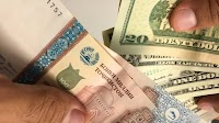 USD/TJS exchange rate decreasing