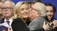 French far-right leader Marine Le Pen pays tribute to her politically polarizing father