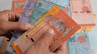 USD/MYR settles below 2 1/2-week high, posts weekly loss