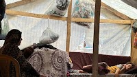 Shot by Israeli troops while getting aid, a boy in Gaza fights for his life