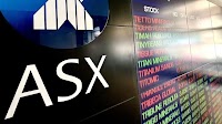 ASX closes higher, but AMP and Cochlear suffer big falls on profit results — as it happened
