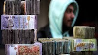 Syrians baffled by sharply fluctuating currency