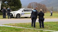 Manhunt under way after two police officers shot dead in rural Australian town