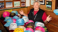 Mad Hatter: Shellback Tavern owner Bob Beverly knew his hats were cool when Mira Costa High students started wearing them