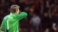 Van der Sar unsure of future as United leaks three