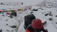 Rescuers race to reach hundreds stranded on Mount Everest by blizzard