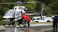 Three hikers rescued after being stranded by weather