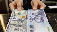 Taiwan dollar's record rally is a trade-war tremor